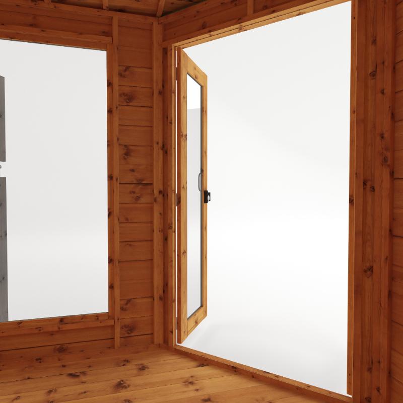 Looking out of the open double doors from within the Mercia 11x7 pent shiplap summer house with side shed into a white background.
