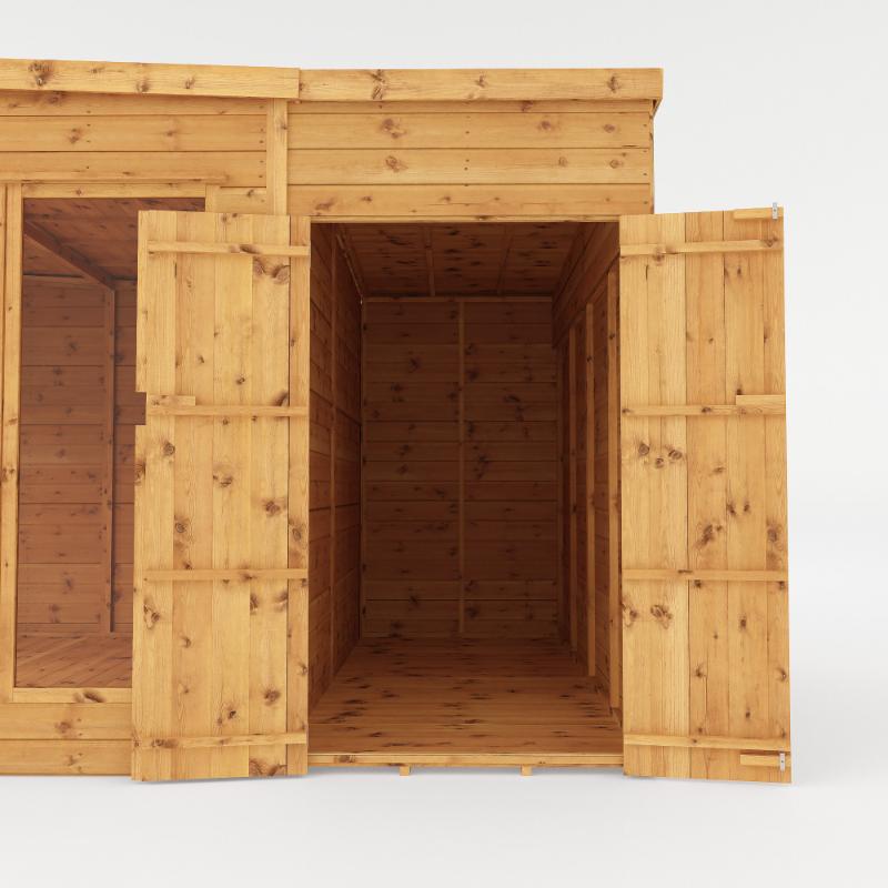 A close up on the open double doors of the Mercia Corner Summerhouse's Side Shed looking into the interior.