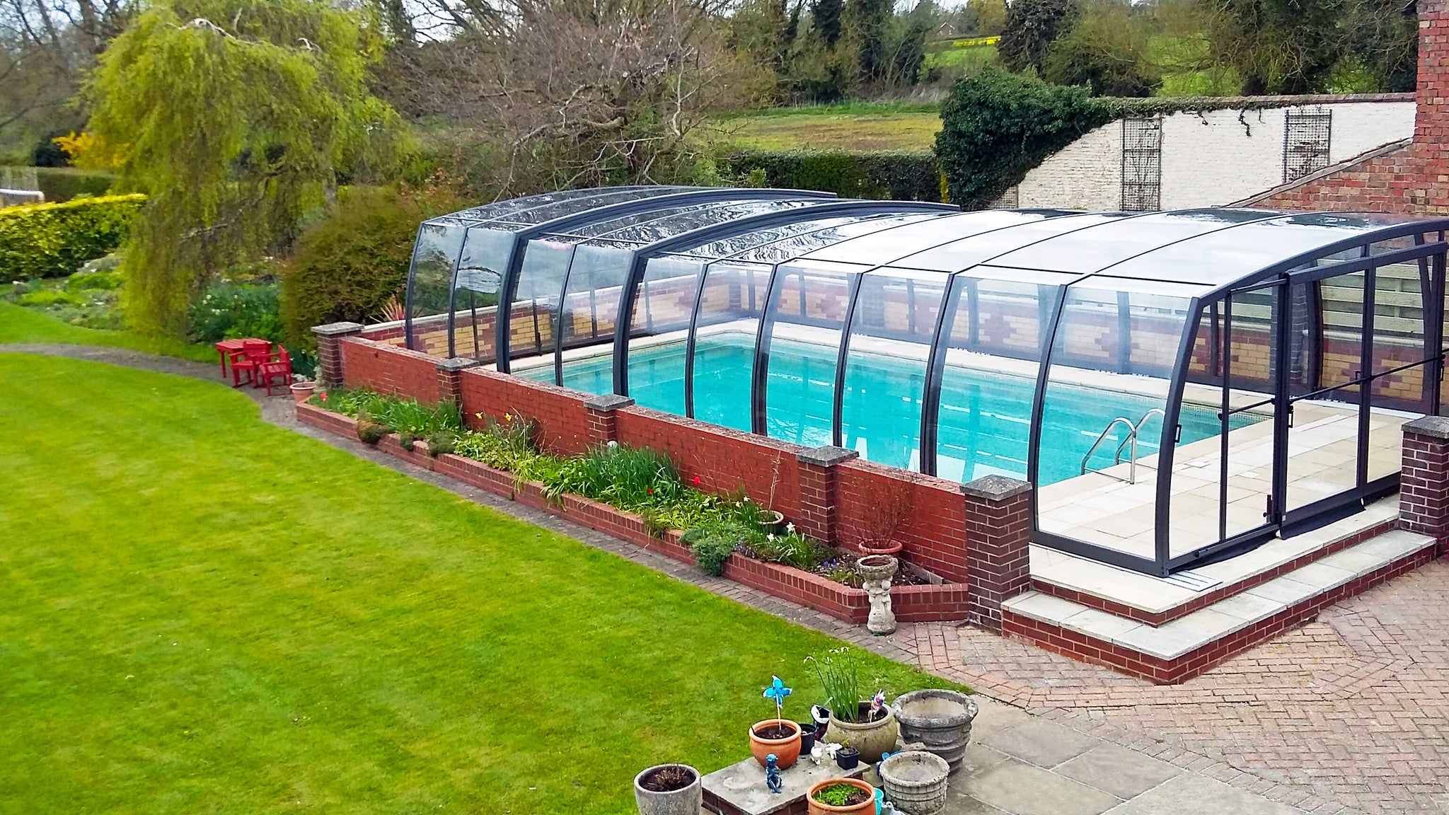 Omega High Retractable Swimming Pool Enclosure Alukov