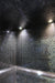 Spot lights in a mosaic tiled steam room