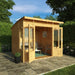 Mercia Helios Summerhouse 8x8 foot in the garden with open double doors.