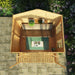 A birds eye view of the Mercia Wessex summerhouse 8x8 foot showing off its interior being used as a lounging area.