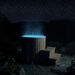Polar Recovery Cyclone wooden ice bath in natural wood, glowing blue LED light at night