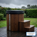 Polar Recovery Cyclone wooden ice bath in natural wood with weatherproof lid on decking