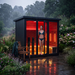 Polar Recovery Eclipse 5 person outdoor infrared sauna, woman inside in rainy garden