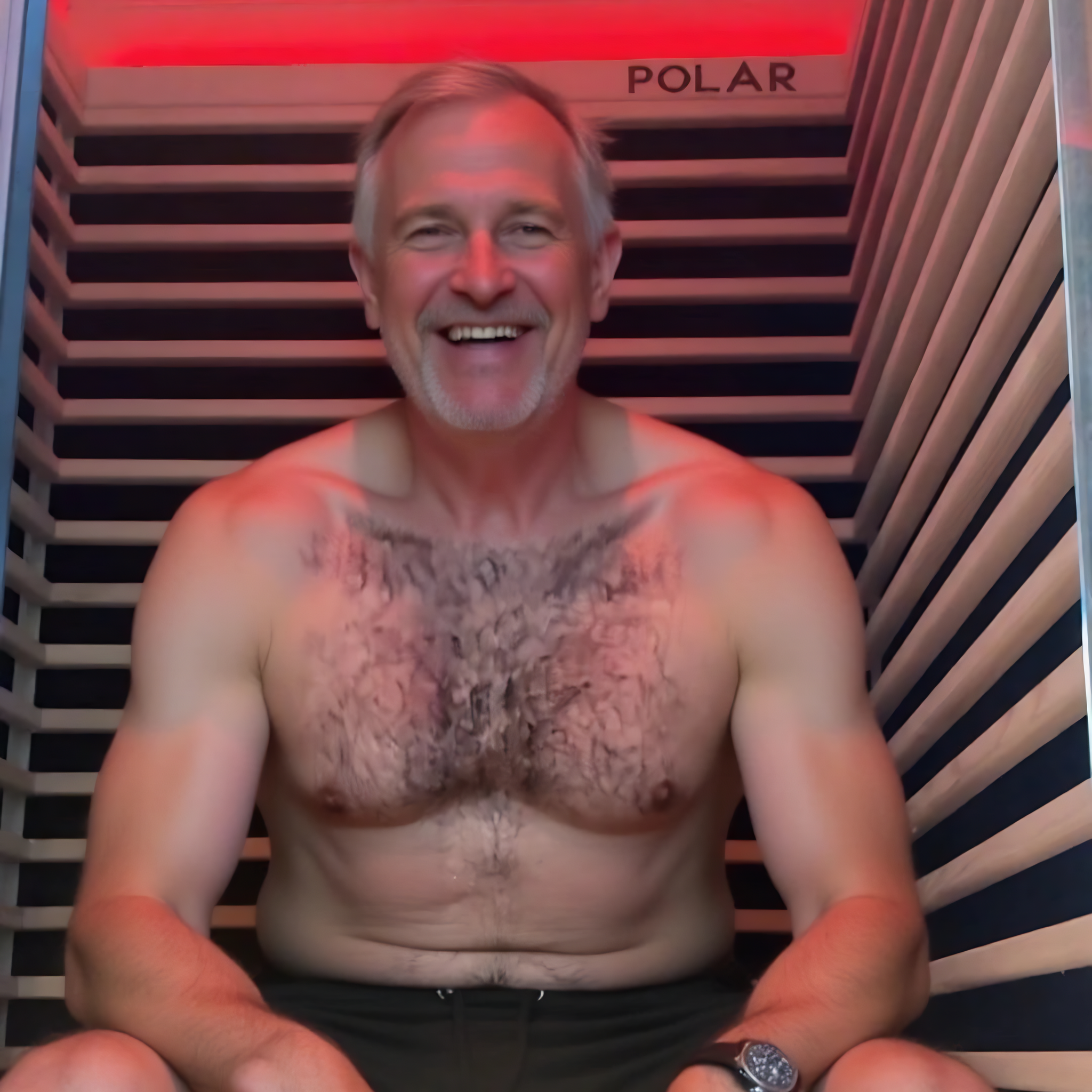 Polar Recovery Nova 1 person infrared sauna, smiling man sitting inside