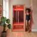 Polar Recovery Nova 1 person infrared sauna, woman in swimsuit in bright room