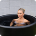 Polar Recovery Elite portable ice bath, close-up of woman bathing