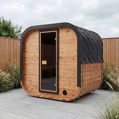 Polar Recovery Sauna Cube 3-5 person outdoor sauna with wood front on a garden patio