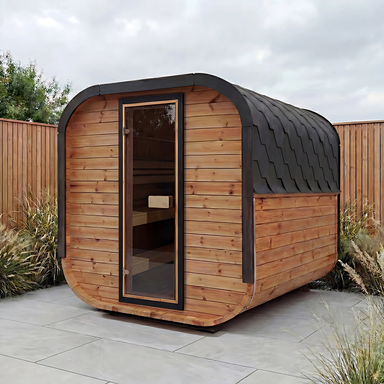 Polar Recovery Sauna Cube 6-8 person outdoor sauna with wood front on a garden patio